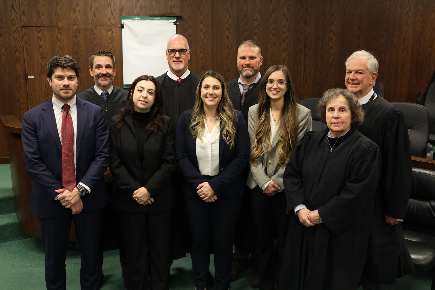 Lycoming County's newest lawyers: David Sterngold, Giovanna Daniele, Kallie Vento, and Lauren Appolonia, here pictured with Judges Tira, Linhardt, Gardner, Butts and Carlucci.