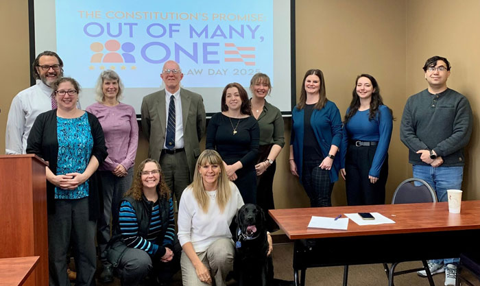 Judge Christian Frey, Michele Frey, Tammy Taylor, Giovanna Danielle, Stephanie Wolak, Jennifer Linn, Jasmin Silver, and Kristian Villegas, and (seated) Stephanie Tempesco, Jerri Rook, and Ludo the Courthouse Dog.  